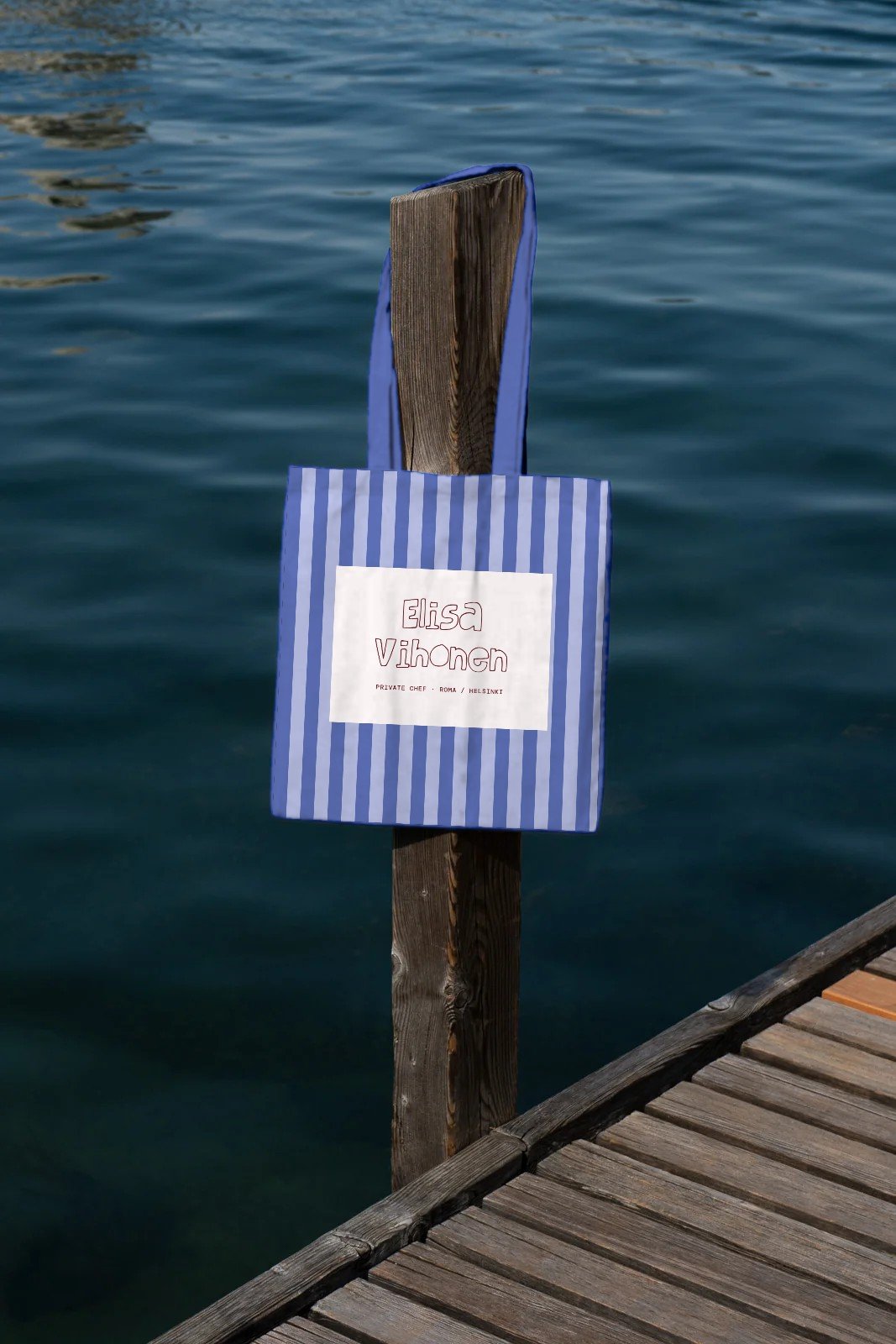 Striped tote on a jetty post